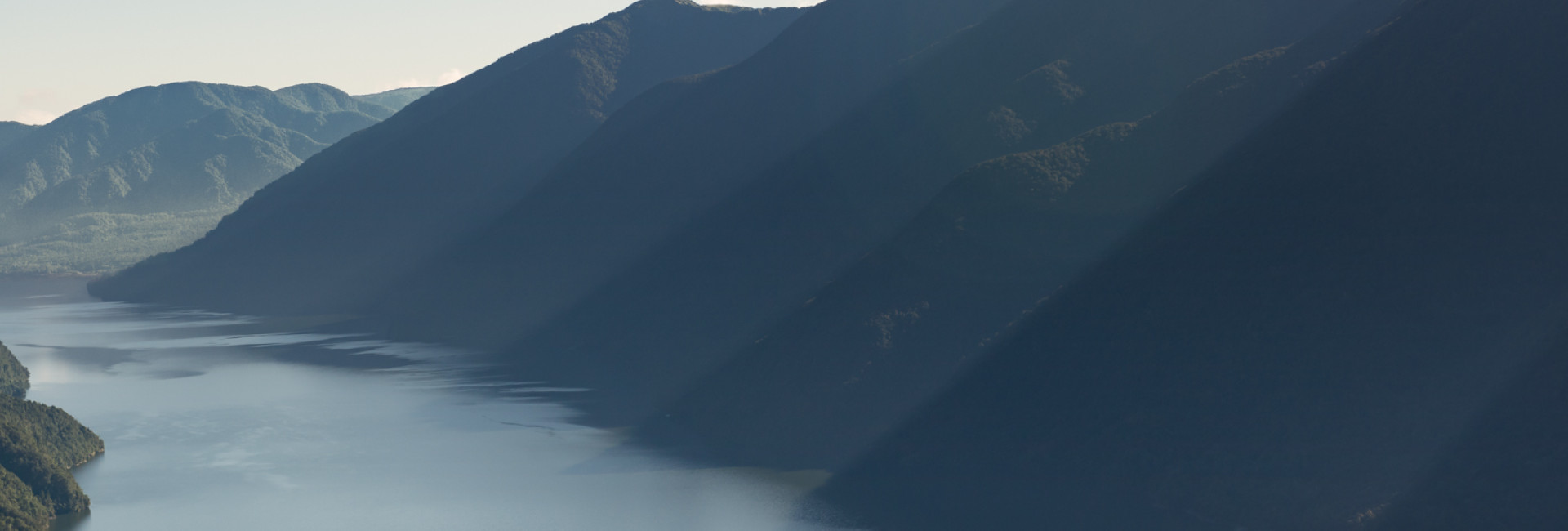 The sides of a mountain range against sea 